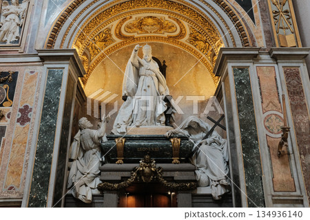 Archbasilica of Saint John Lateran interior Rome golden coffered ceiling marble columns statues ornate chapels baptistery and apse Catholic basilica Italy. High quality photo Archbasilica of Saint John Lateran interior Rome golden coffered ceiling marble columns statues ornate chapels baptistery and apse Catholic basilica Italy. High quality photo 134936140