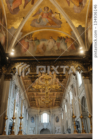 Archbasilica of Saint John Lateran interior Rome golden coffered ceiling marble columns statues ornate chapels baptistery and apse Catholic basilica Italy. High quality photo Archbasilica of Saint John Lateran interior Rome golden coffered ceiling marble columns statues ornate chapels baptistery and apse Catholic basilica Italy. High quality photo 134936146