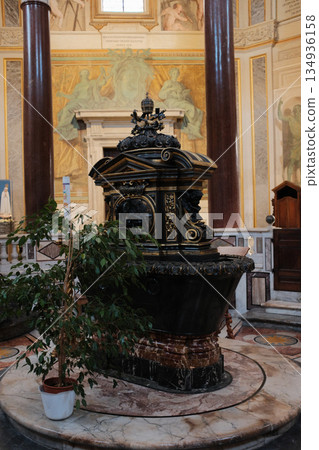 Archbasilica of Saint John Lateran interior Rome golden coffered ceiling marble columns statues ornate chapels baptistery and apse Catholic basilica Italy. High quality photo Archbasilica of Saint John Lateran interior Rome golden coffered ceiling marble columns statues ornate chapels baptistery and apse Catholic basilica Italy. High quality photo 134936158