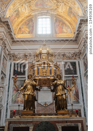Basilica of Saint Mary Major Rome ornate gilded altar with reliquary marble columns baroque chapel interior sacred art vertical composition editorial use only. High quality photo Basilica of Saint Mary Major Rome ornate gilded altar with reliquary marble columns baroque chapel interior sacred art vertical composition editorial use only. High quality photo 134936169