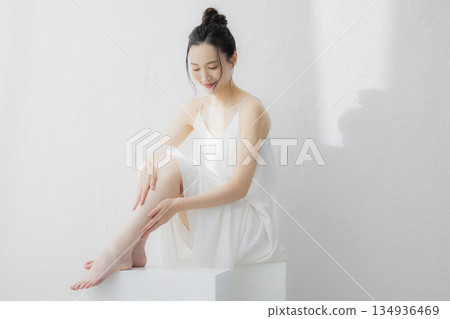 Women who massage their legs 134936469