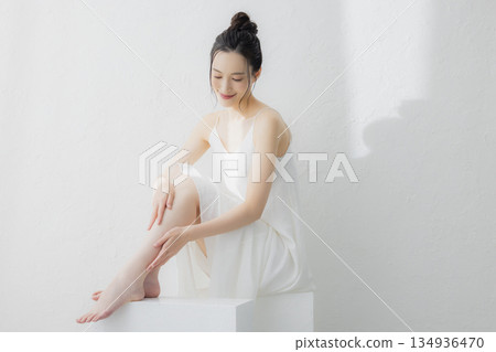 Women who massage their legs Women who massage their legs 134936470