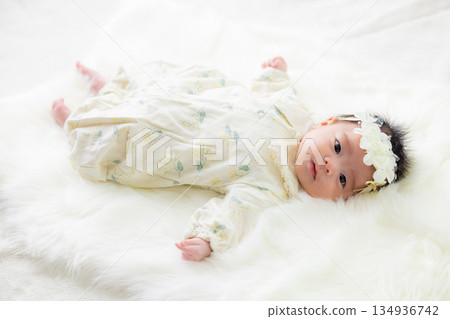 baby sleeping in bed 134936742