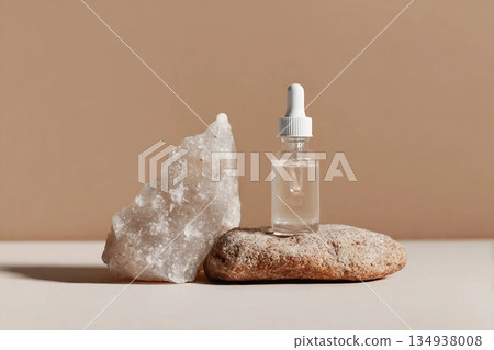 Glass dropper bottle with extract coconut or serum on stand from natural stones on beige background. Natural Organic Spa Cosmetic concept, cosmetic product mock up, minimal style. Side view, copyspace Glass dropper bottle with extract coconut or serum on stand from natural stones on beige background. Natural Organic Spa Cosmetic concept, cosmetic product mock up, minimal style. Side view, copyspace 134938008