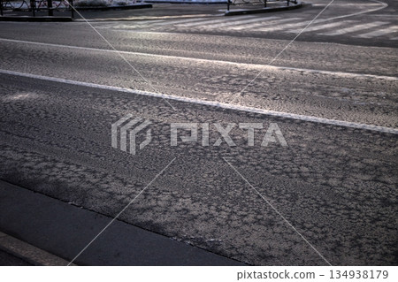 Frozen road surface Frozen road surface 134938179