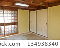 Yellow gypsum board on top of structural plywood, with a thin wooden frame around it 134938340