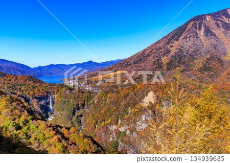 Kegon Falls and Lake Chuzenji seen from Akechidaira in autumn foliage, Nikko City, Tochigi Prefecture Kegon Falls and Lake Chuzenji seen from Akechidaira in autumn foliage, Nikko City, Tochigi Prefecture 134939685