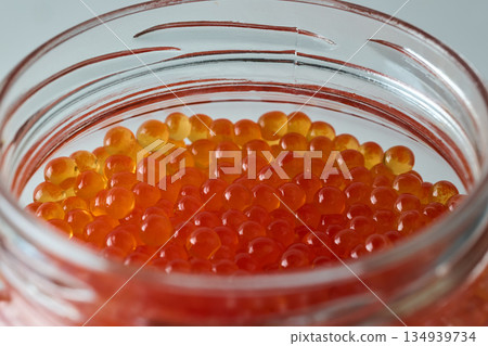 Fresh Red Caviar in Glass Jar Close Up. High quality photo 134939734