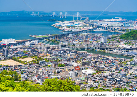 <Kagawa Prefecture> View of the cityscape and Aonoyama overlooking the Seto Ohashi Bridge <Kagawa Prefecture> View of the cityscape and Aonoyama overlooking the Seto Ohashi Bridge 134939970