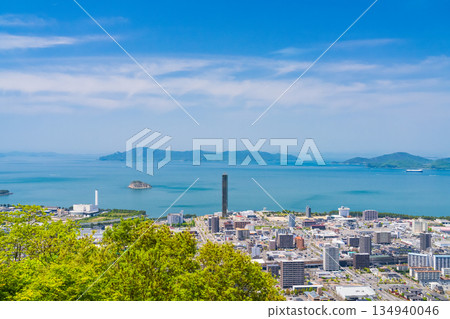 Tokyo: Cityscape overlooking the Seto Inland Sea and Aonoyama mountain view Tokyo: Cityscape overlooking the Seto Inland Sea and Aonoyama mountain view 134940046