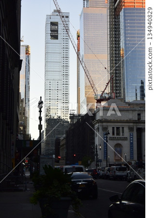 New York, Manhattan, buildings and cranes under construction at dawn New York, Manhattan, buildings and cranes under construction at dawn 134940829
