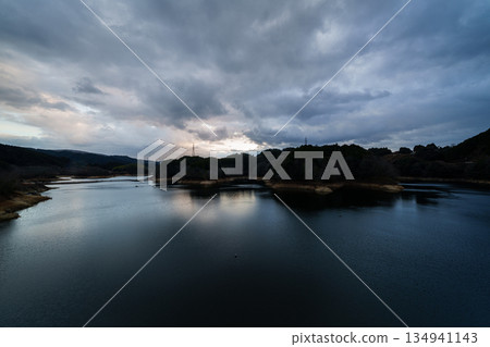 New Year's evening view of Nunome Dam in Nara - Clouds blowing over Lake Nunome and the lake surface reflecting the sky (10) 134941143