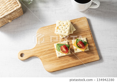 Cheese topping on crackers Cheese topping on crackers 134942280