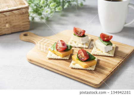 Cheese topping on crackers Cheese topping on crackers 134942281