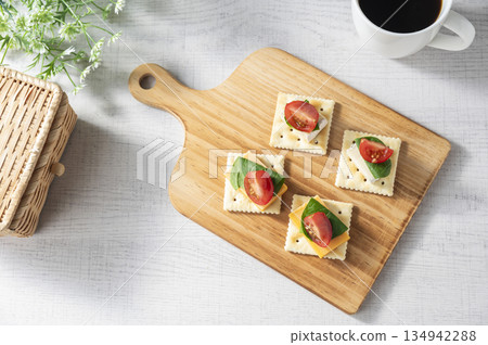 Cheese topping on crackers Cheese topping on crackers 134942288
