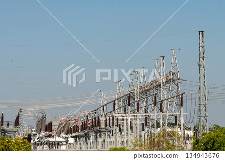 A high voltage power plant to supply electricity to the city. A high voltage power plant to supply electricity to the city. 134943676