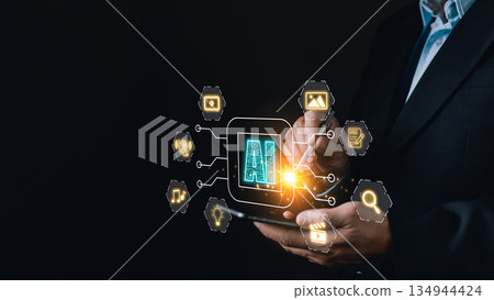 A business professional holds a glowing AI interface by icons for media, search, and documents, symbolizing AI driven marketing, content creation, and innovative digital automation solutions. A business professional holds a glowing AI interface by icons for media, search, and documents, symbolizing AI driven marketing, content creation, and innovative digital automation solutions. 134944424