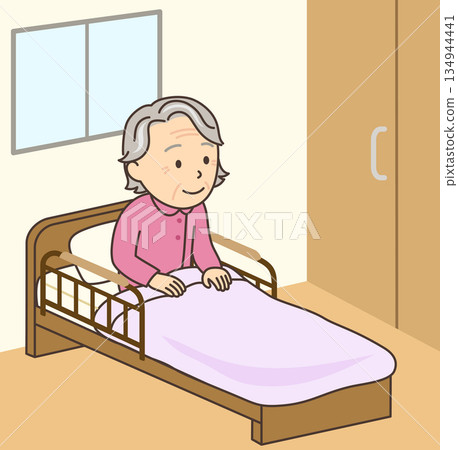 An elderly woman sitting up on a nursing bed An elderly woman sitting up on a nursing bed 134944441