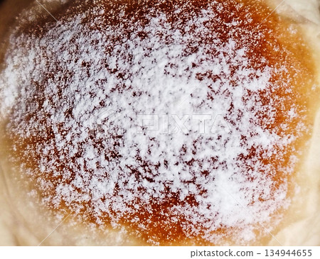 Powdered sugar pastry bun. Close up dessert. Powdered sugar pastry bun. Close up dessert. 134944655