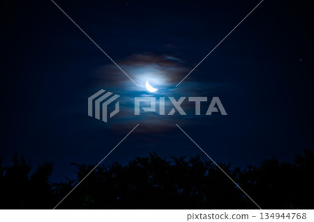 A beautiful moon floating in the sky 134944768