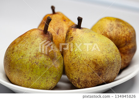 Macrophotography of raw fruits on a white background Macrophotography of raw fruits on a white background 134945826