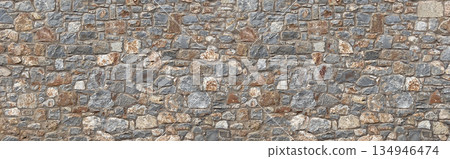 Stone masonry wall showing rustic texture background 134946474