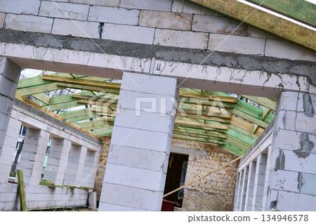 Construction site.New building extension from aerated concrete blocks Construction site.New building extension from aerated concrete blocks 134946578
