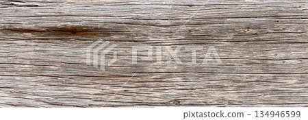 Weathered aged wooden board showing rustic texture 134946599
