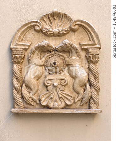 Decorative classical plaster relief with horses on wall Decorative classical plaster relief with horses on wall 134946603