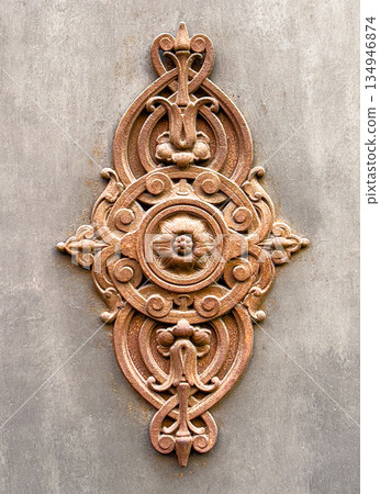 Ornate antique wrought iron floral decorative ornament Ornate antique wrought iron floral decorative ornament 134946874