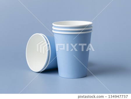 Disposable light blue paper cups closeup, mockup, copy space. No plastic biodegradable single-use 134947737