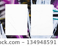 colorful urban wall texture with two wrinkled glued poster templates 134948591