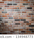 Close-up of red brick wall texture with rough masonry and mortar joints - building surface filling the frame 134948773