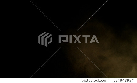 Freeze Motion Shot of Flying Sand Dust , Isolated on Black Background Freeze Motion Shot of Flying Sand Dust , Isolated on Black Background 134948954