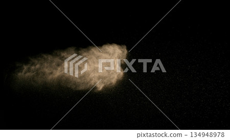 Freeze Motion Shot of Flying Sand Dust , Isolated on Black Background 134948978
