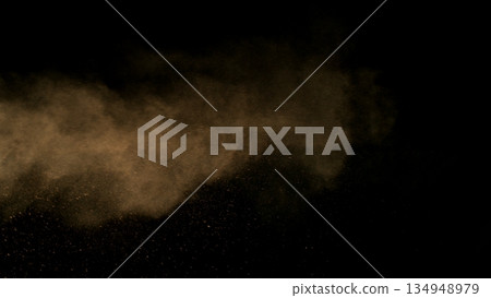 Freeze Motion Shot of Flying Sand Dust , Isolated on Black Background 134948979