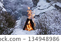 Crackling Campfire in the Winter Foggy Rocky Mountains , Harsh Atmosphere , Authentic Place Crackling Campfire in the Winter Foggy Rocky Mountains , Harsh Atmosphere , Authentic Place 134948986
