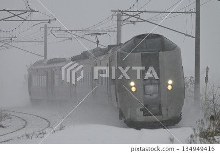 The Kamui Express train running through a snowstorm The Kamui Express train running through a snowstorm 134949416