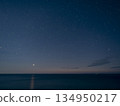 Venus sinking into the East China Sea and Venus Road reflected in the sea 134950217