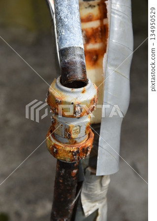 Deterioration of repair marks on aging household water pipes Deterioration of repair marks on aging household water pipes 134950529