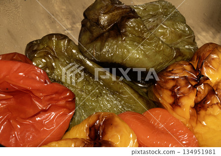 Close up or red green and yellow fried roasted sweet peppers 134951981