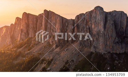 Panoramic view of national park Bolshoy Tkhach mountain in Caucasus with sunset tones 134953709