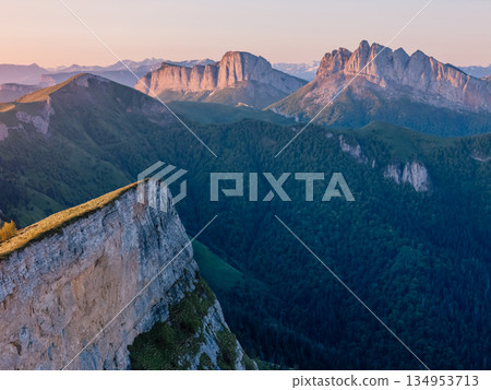 Mountains with dolomite rocks at sunrise with sunrise light. 134953713