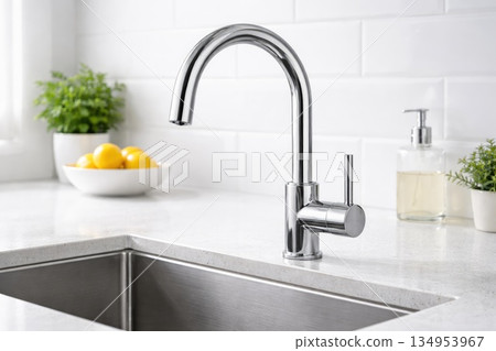 Modern Kitchen Sink with Chrome Faucet in Bright Minimal Interior 134953967