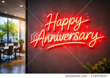 Glowing Red Happy Anniversary Neon Sign in Modern Office Interior Glowing Red Happy Anniversary Neon Sign in Modern Office Interior 134954037