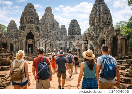 Travelers Exploring Bayon Temple Complex at Angkor Thom Travelers Exploring Bayon Temple Complex at Angkor Thom 134954066