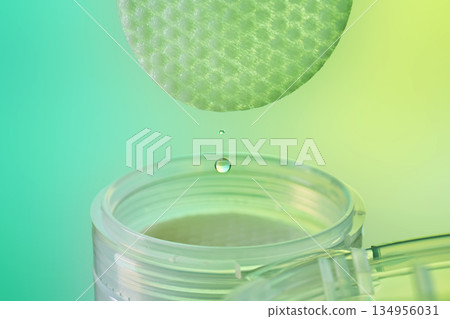 Skincare toner pad dropping cosmetic liquid for hydration 134956031