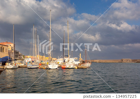 Yachts in Venetian Harbor of Chania, Greece Yachts in Venetian Harbor of Chania, Greece 134957225