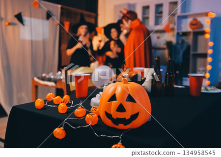 Friends enjoying a Halloween party at a bar making a toast Friends enjoying a Halloween party at a bar making a toast 134958545