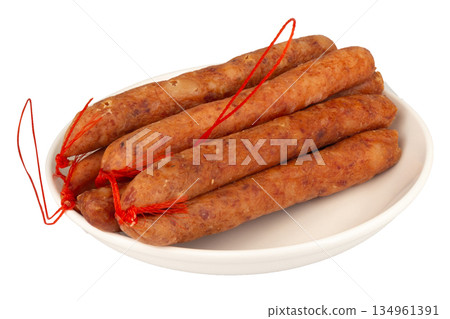 Thai pork sausage on a white plate against a white background 134961391